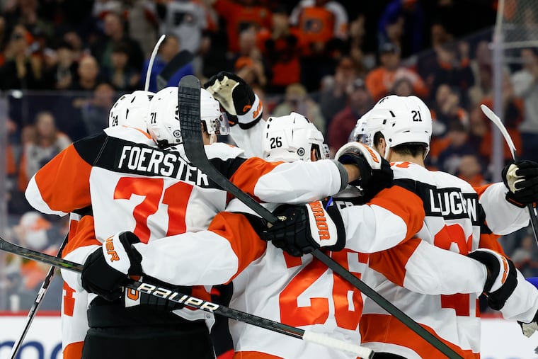 The Flyers' Tyson Foerster celebrates his second period goal against the Senators with his teammates on Saturday.