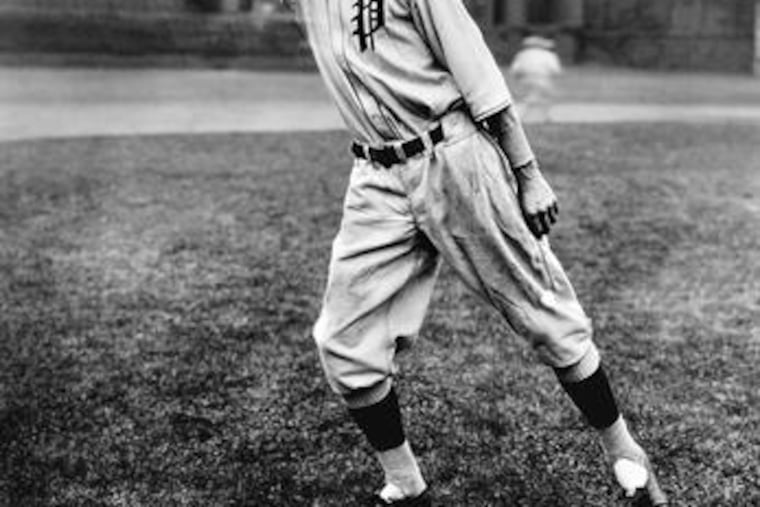 Slugger Cy Williams simulating a stretching catch at the Baker Bowl in 1926, four years after the Phillies and Cubs made history.