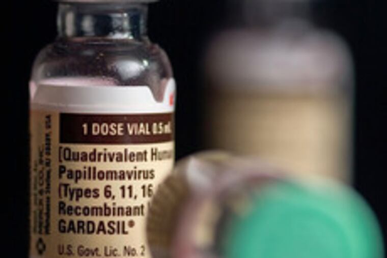 Bottles of Gardasil. The HPV vaccine helped Merck post solid third-quarter results.