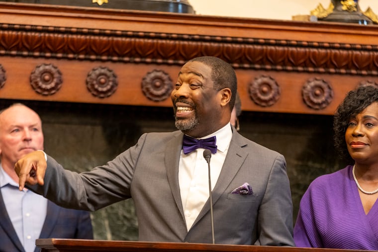 City Council President Kenyatta Johnson, center, said his 2026 agenda includes "due diligence" on school closings, passing the city budget, and advancing Mayor Parker's housing initiative.