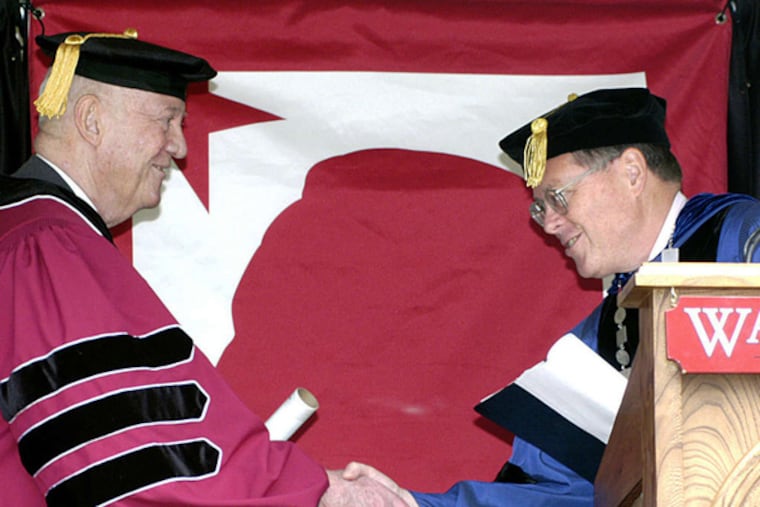 John Eisenhower (left), a president's son who built a career in letters, gets an honorary degree in 2005 at Washington College in Maryland. (AP)