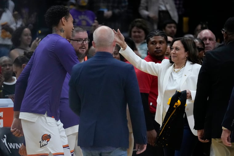 Brittney Griner (42) was greeted by Vice President Kamala Harris before her first game back in the WNBA on Friday.