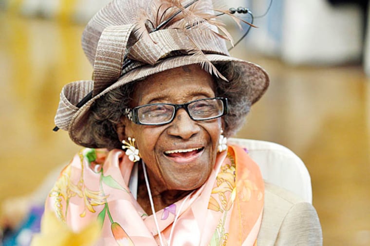 Anna Henderson was dressed to the nines for the 2012 centenarian luncheon. Her famous smile completed any outfit. (David Maialetti/Staff/File)