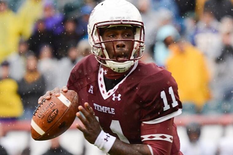 Temple quarterback P.J. Walker scrambles to his right during the third quarter of Temple's 20-10 upset win over East Carolina on Saturday, Nov. 1, 2014 at Lincoln Financial Field. (Andrew Thayer/Staff Photographer)