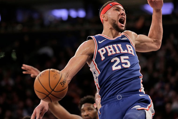 Ben Simmons celebrates a first-half dunk during the Sixers' win on Sunday.