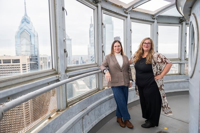 The Greater Philadelphia Film Office co-executive directors Erin Wagner (left) and Nicole Shiner (right) pose for a portrait at the observation deck at Philadelphia’s City Hall on Wednesday, Oct. 29, 2025.