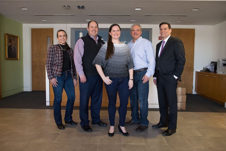 Dressed for their day at Kreischer Miller in Horsham are (from left) Kristin Seeger, Roman Leshak, Bobbi D. Kelly, Bill Moscola, and Rich Nelson.