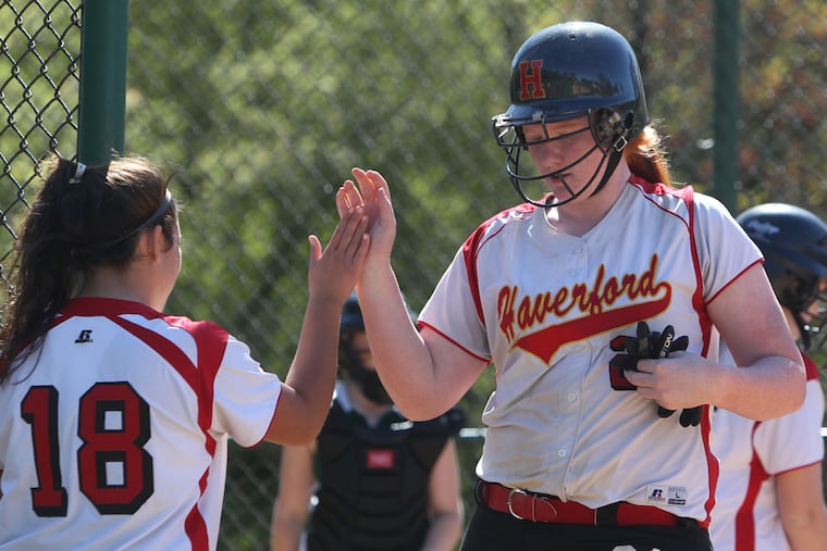 Haverford High's Bridget Newman is congratulated by teammate Deanna Costante after she scored against Ridley last season. (Ron Cortes/Staff Photographer)