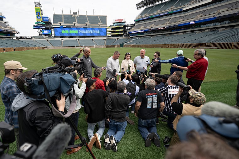 Meg Kane (center), executive of Philadelphia Soccer 2026, and a Philadelphia Eagles official speak to members of the media during a news conference in May about pitch preparations for matches during the 2026 FIFA World Cup at Lincoln Financial Field in Philadelphia.