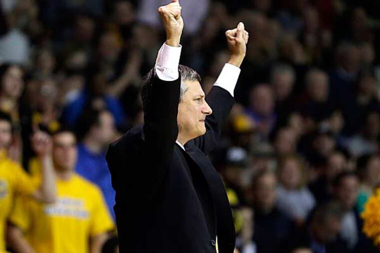 La Salle head coach John Giannini reacts after a basket during the second half of an NCAA college basketball game against Butler, Wednesday, Jan. 23, 2013, in Philadelphia. La Salle won 54-53. (Matt Slocum/AP)
