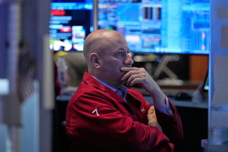 John Mauro works on the floor at the New York Stock Exchange in New York, Tuesday, April 7, 2026.