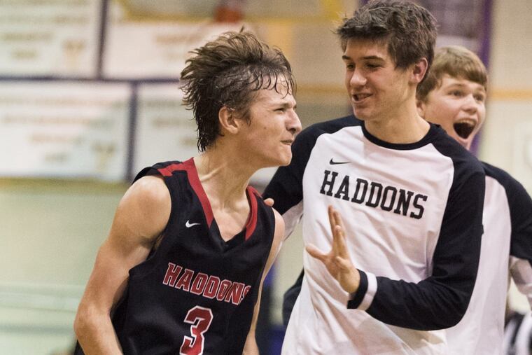 Mike Depersia (left) of Haddonfield celebrates after making a shot three-quarters length of the court at the end of the 3rd quarter in the South Jersey Group 2 Final in boys' basketball on March 7, 2017.
