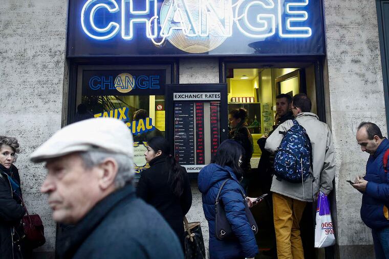 Currency markets were a bit calmer Friday, but the repercussions of the Swiss National Bank policy change on limiting the rise of the franc continued to be felt around the globe.