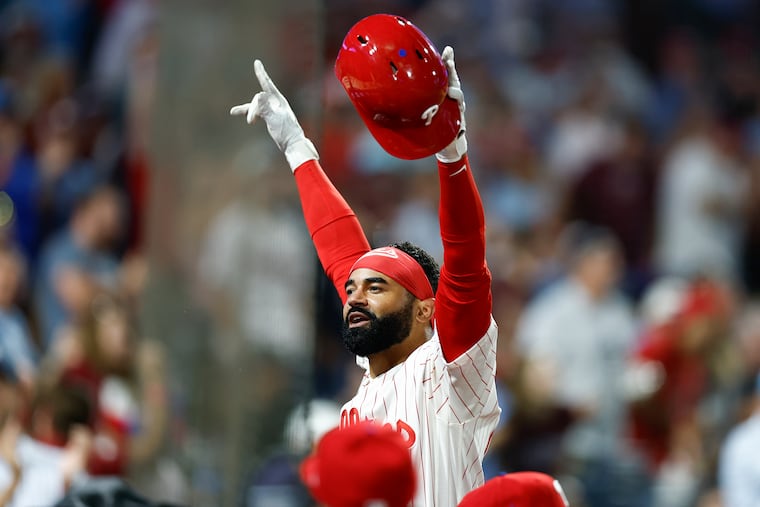 Derek Hill celebrates his seventh-inning grand slam against the Nationals on Monday.