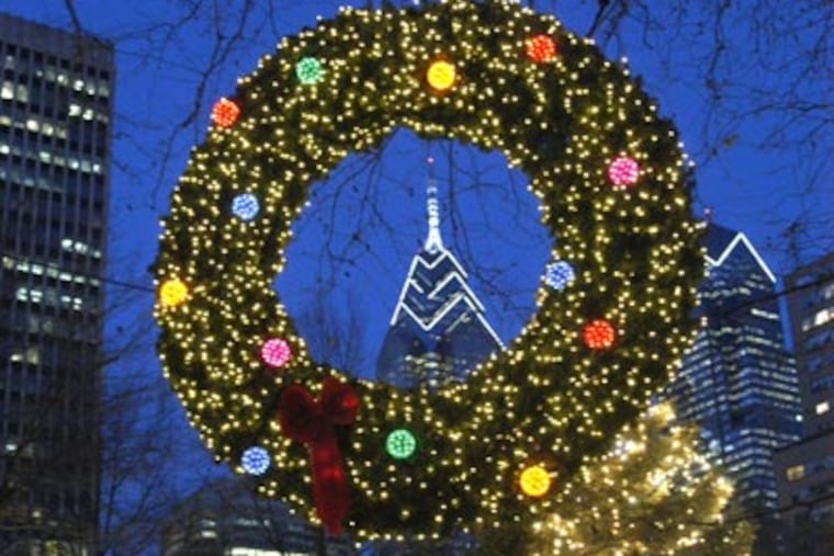 Lights, wreath and Christmas trees fill Rittenhouse Square in 2004. (Peter Tobias / File Photo)