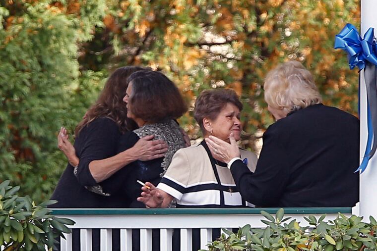 Family and friends meet outside the Blake-Doyle Funeral Home in Collingswood at Brendan Link Creato’s viewing.