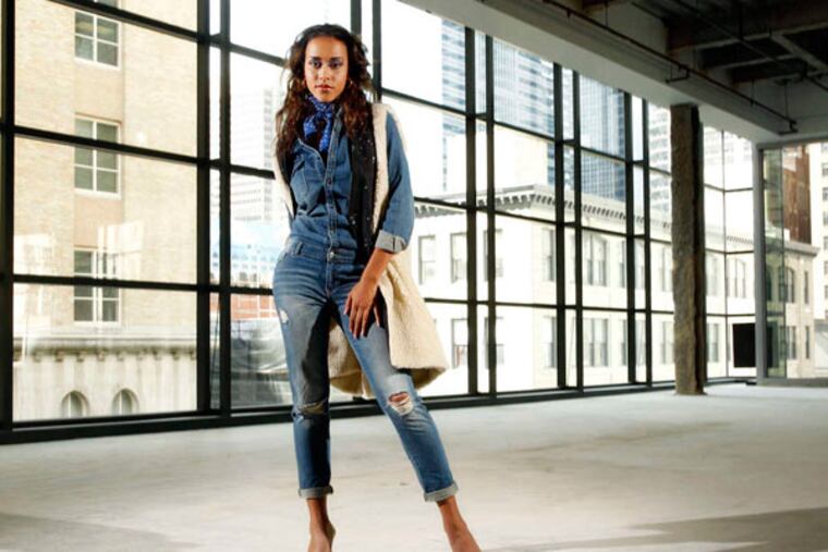 Denim jumpsuit, Signature 8, $110, at Alicia DiMichele; Stone wash vest, Maison Martin Margiela MM6, $690, at Erdon; 18-karat yellow-gold hoop earrings, Antonio Papini Gioielli, price upon request, at Bernie Robbins Jewelers; polka dot scarf, Paul Smith, $295, at Knit Wit. (Michael Bryant/Staff Photographer)