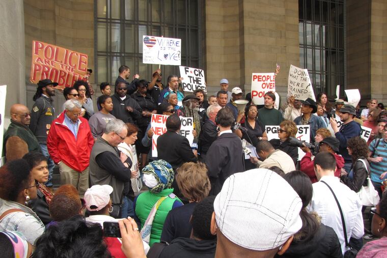 Pittsburgh residents gather in 2010 to protest the physical beating of an 18-year-old by three plainclothes police officers.