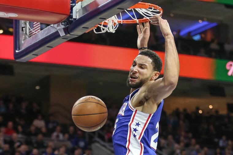 Sixers' Ben Simmons dunks against the Nuggets during the 1st quarter at the Wells Fargo Center in Philadelphia, Tuesday, December 10, 2019.