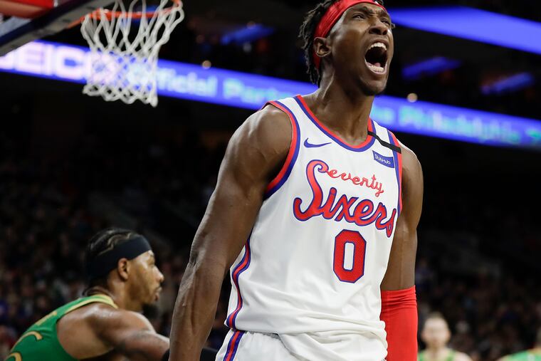 Sixers guard Josh Richardson yells after a fourth-quarter dunk against the Celtics on Thursday.