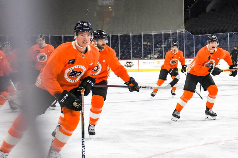 Ronnie Attard (47) sprints around the rink during the Flyers morning skate ahead of their home game against the Columbus Blue Jackets on Tuesday, April 5, 2022.