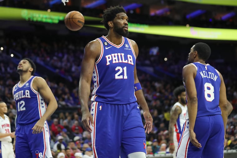Sixers center Joel Embiid and his teammates stand on the court during Wednesday's game. Their schedule gets a bit tougher going forward.