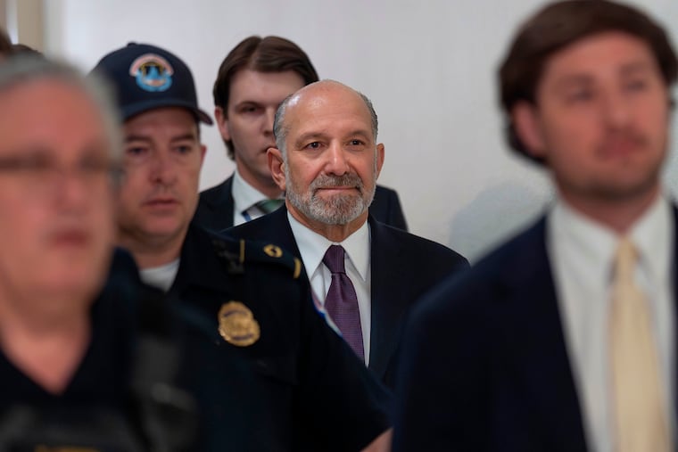 Commerce Secretary Howard Lutnick arrives Wednesday for a deposition as part of the House Oversight Committee's investigation of convicted sex offender Jeffrey Epstein.