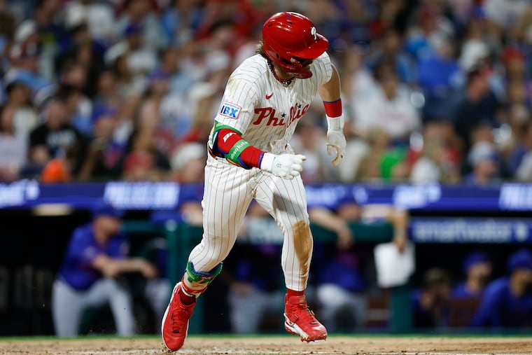 Phillies Bryce Harper runs out of the batter's box for a fifth-inning triple against the Mets on Saturday. He'd hot for his first career cycle.