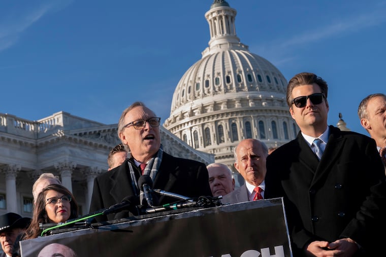 Rep. Andy Biggs, R-Ariz., and members of the conservative House Freedom Caucus, from left, Rep. Lauren Boebert, R-Colo., Rep. Louie Gohmert, R-Texas, Rep. Matt Gaetz, R-Fla., and Rep. Scott Perry, R-Pa., talk to reporters at the Capitol in Washington last month. Biggs and this core group led the effort to thwart Republican Leader Kevin McCarthy, R-Calif., from becoming speaker of the House.