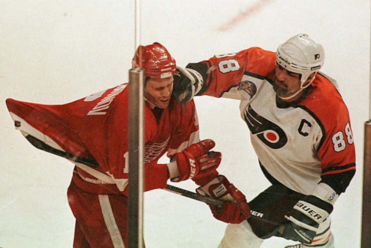 Eric Lindros roughs up the Red Wings' Vladimir Konstantinov during Game 1 of the Flyers' eventual Stanley Cup Final loss to Detroit in 1997.