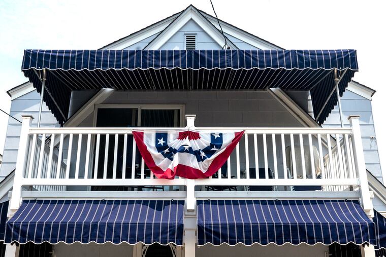 Awnings on a porch and balcony in Stone Harbor, Sunday, June 11, 2023.