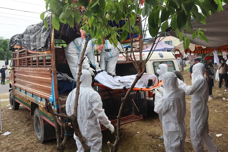 In one Nepal district, flood catastrophe is measured in bodies and burial trenches In one Nepal district, flood catastrophe is measured in bodies and burial trenches
