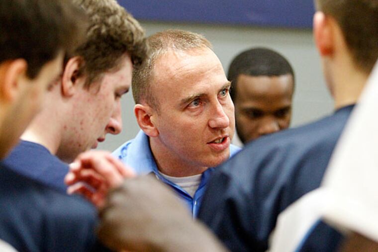 Coach Dan Williamsson interacting with payers. (Akira Suwa/Staff Photographer)