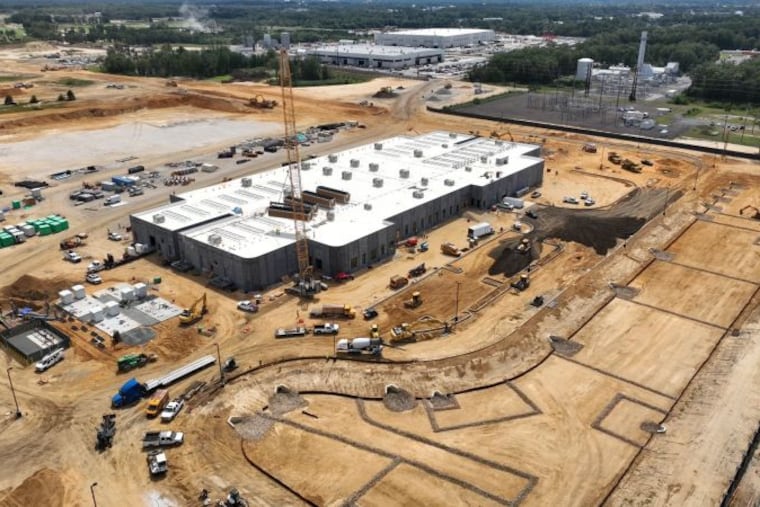 AI data centers, such as this one under construction in Vineland, require a lot of energy, and that can increase consumers' bills. Elected officials in Pennsylvania and New Jersey hope to help.