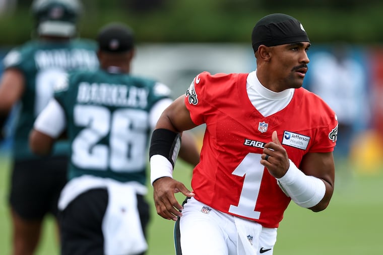 Eagles defensive coordinator Vic Fangio says Jalen Hurts (1) looks faster, and he should know.