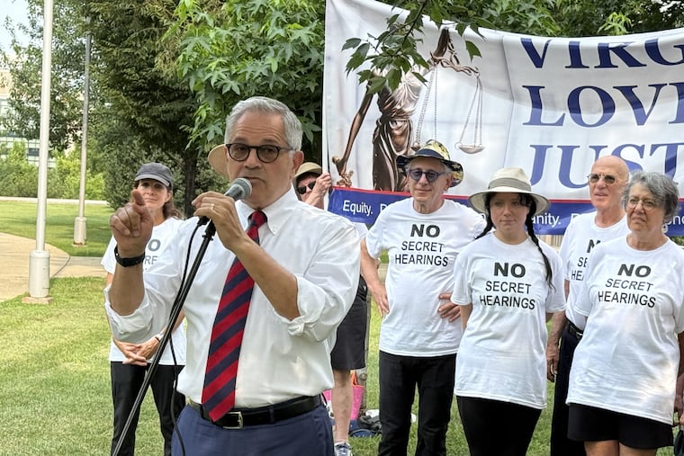 Philadelphia District Attorney Larry Krasner speaks at a protest as Parisa Dehghani-Tafti, the Commonwealth's Attorney for Arlington County and the Falls Church in Virginia, testifies in a private meeting with the U.S. House Judiciary Committee on Thursday in Washington, D.C.