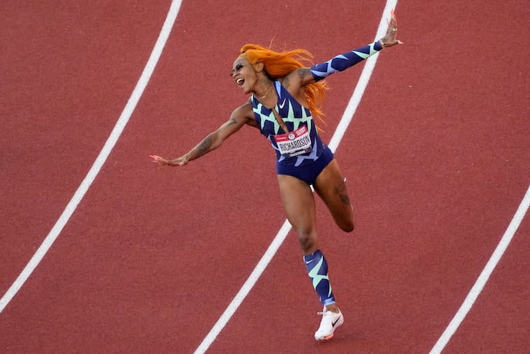 Sha'Carri Richardson celebrates after winning the women's 100-meters at the U.S. Olympic Track and Field Trials on Saturday.