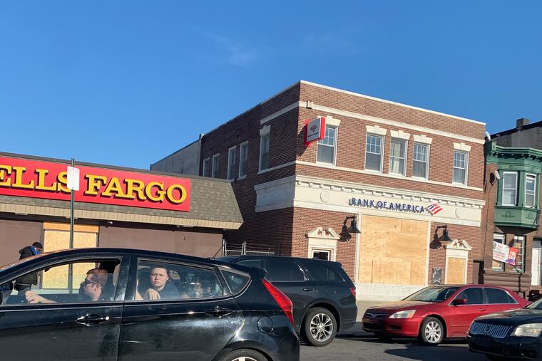 The boarded up Wells Fargo and Bank of America branches on East Allegheny Avenue in Philadelphia's Port Richmond section earlier this month.