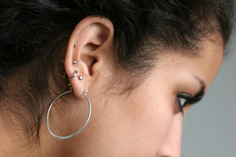 Multiple ear piercings, extending up into the cartilage, may need extra attention, one teen girl learned.