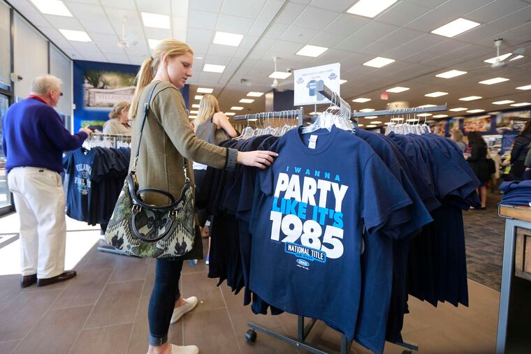 Villanova University senior Michelle Weise, 21, shops at Villanova University Shop, where sales of Wildcats gear have been brisk.