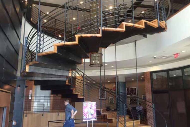 The lobby in the Granary aims to attract business and millennial tenants by includinga business lounge, computer stations, bike racks, a dog-grooming station, and a party area.