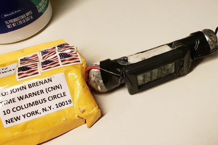 This image obtained Wednesday, Oct. 24, 2018, and provided by ABC News shows a package addressed to former CIA head John Brennan and an explosive device that was sent to CNN's New York office.