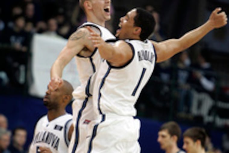 Mike Nardi celebrates with Scottie Reynolds after hitting a three-pointer against Notre Dame. "He's the heart and soul of this program," coach Jay Wright said.