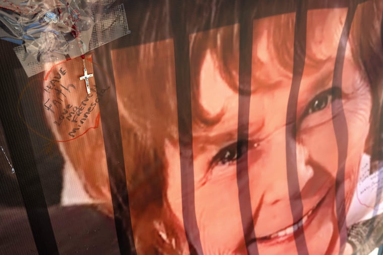 A banner with notes from hundreds of well-wishers for Nancy Guthrie, the missing mother of "Today" show host Savannah Guthrie, is displayed outside of KVOA Newsroom on March 6 in Tucson, Ariz.