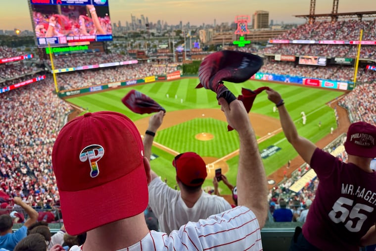 Phillies fans cheer on the team during Game 1 of the NLDS at Citizens Bank Park on Saturday.