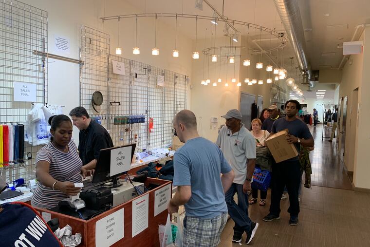 On the last day of business at the celebrated Army & Navy retailer, I. Goldberg, a long line snaked to the back of the store, at 718 Chestnut St. on Aug. 23, 2019.