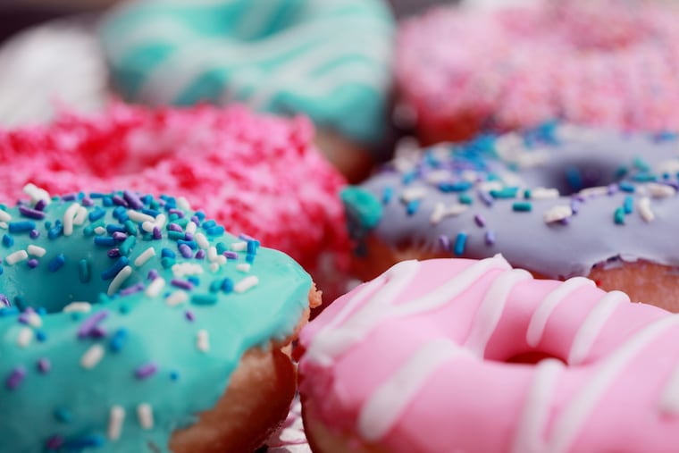 A file photo of decorated doughnuts. Vegan grocer Cindy's Snacks claims Long Island vegan and gluten-free bakery Savory Fig purported Dunkin' Donuts' treats as their own and falsely sold them as allergy-safe. Then, the internet found out.