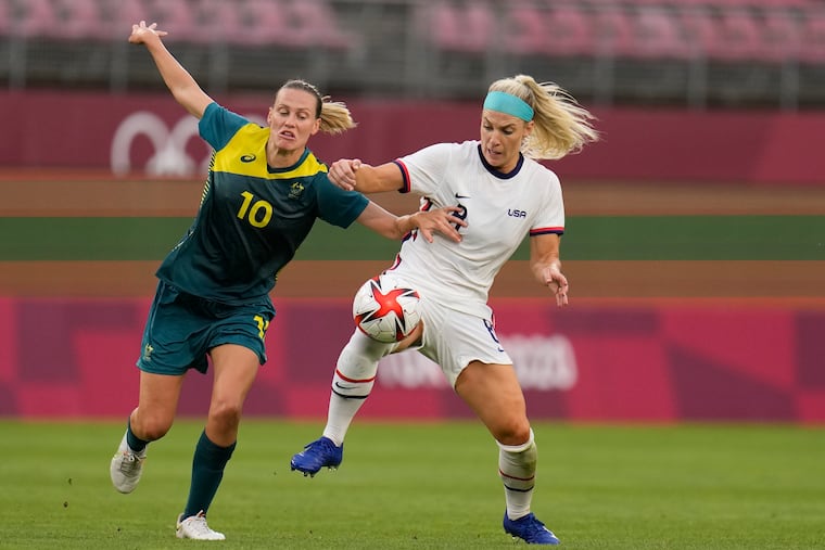 Julie Ertz (right) and Australia's Emily Van Egmond battle for the ball during the first half.