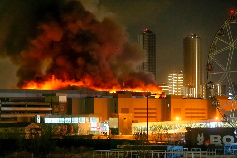 A massive blaze is seen over the Crocus City Hall on the western edge of Moscow on Friday.