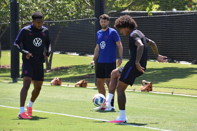 Chris Richards (right) at work during Friday's U.S. practice.